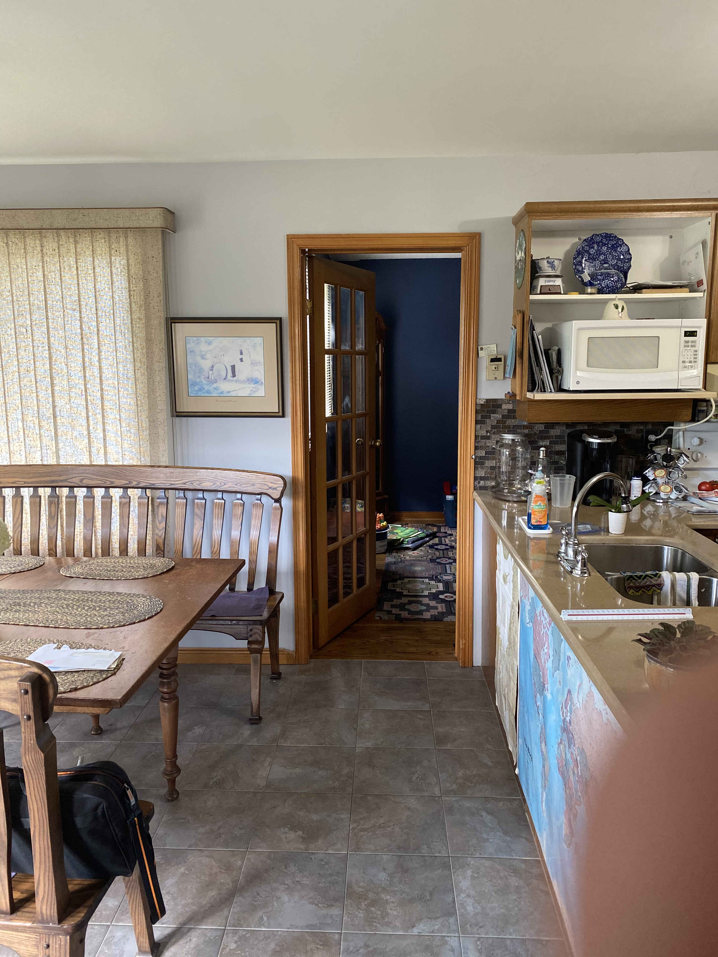Open-concept kitchen renovation before photo